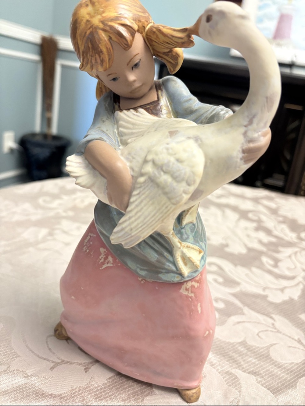 Lladro, Porcelain Girl Figurine Holding a Goose - Pink Skirt, Blue Top.